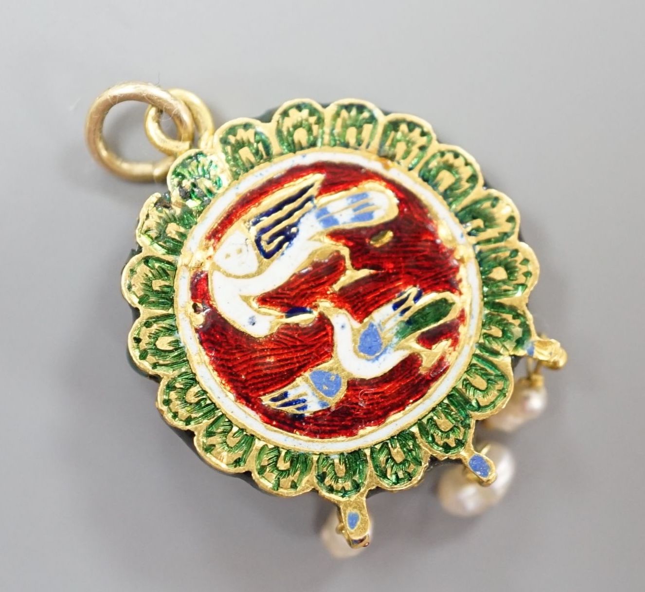 An Indian yellow metal, turquoise, baroque pearl and enamel set drop pendant, overall 33mm.